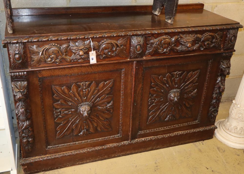 A late 19th century Flemish oak sideboard, W.140cm, D.45cm, H.92cm